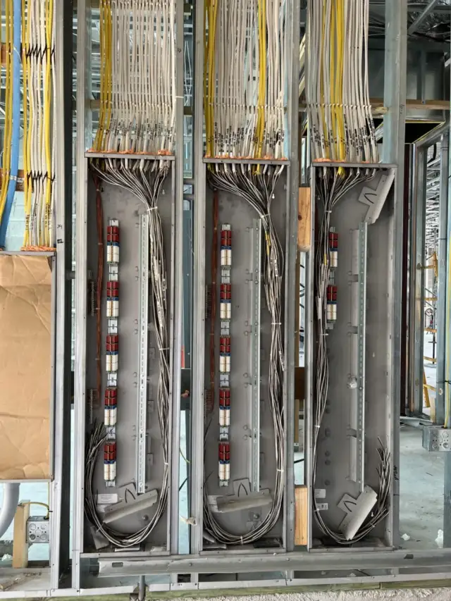 Actual construction-stage Control4 centralized lighting panels and prewire in Boca Raton